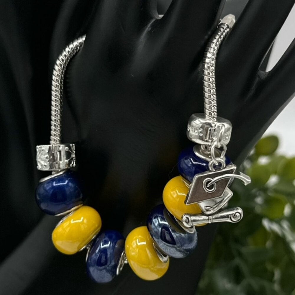 Pandora Style UofM Colligate Yellow/Blue Bracelet with Graduation Cap, NWOT
